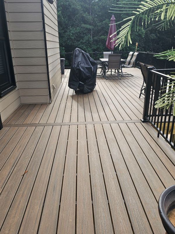 Outdoor living deck space designed by Upperdeckz near Johns Creek